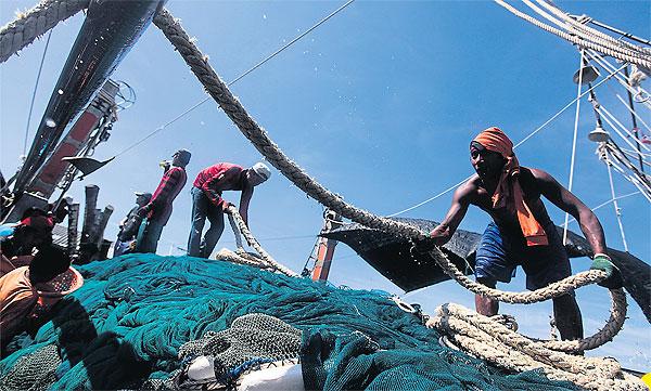 Visserij Gastarbeiders aan het werk
